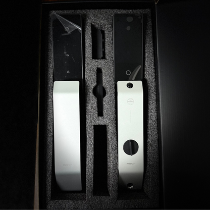 Set of electronic door locks in a black box with a dark background